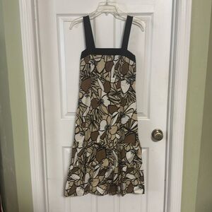 Flowery dress with adjustable straps, only worn one time
